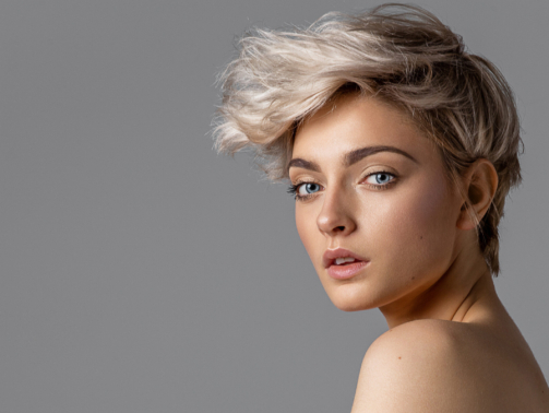 Beauty portrait of fashion young model with short hair